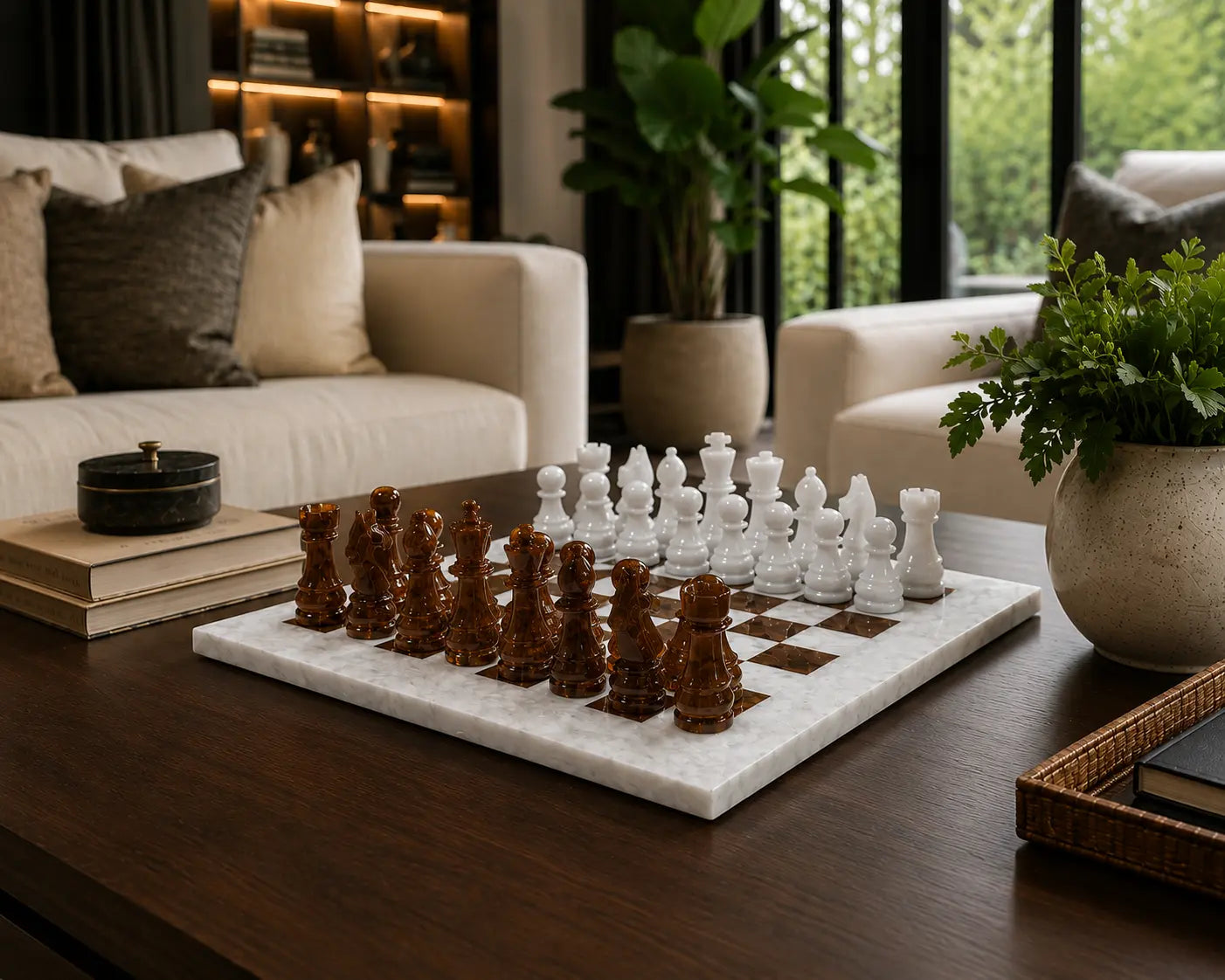 A marble chess set with dark brown wooden pieces and white stone pawns arranged on a dark wood coffee table in a modern living room setting.